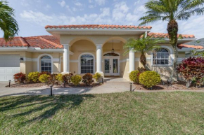 Luxe Waterfront Oasis with Dock, Heated Pool and Spa!